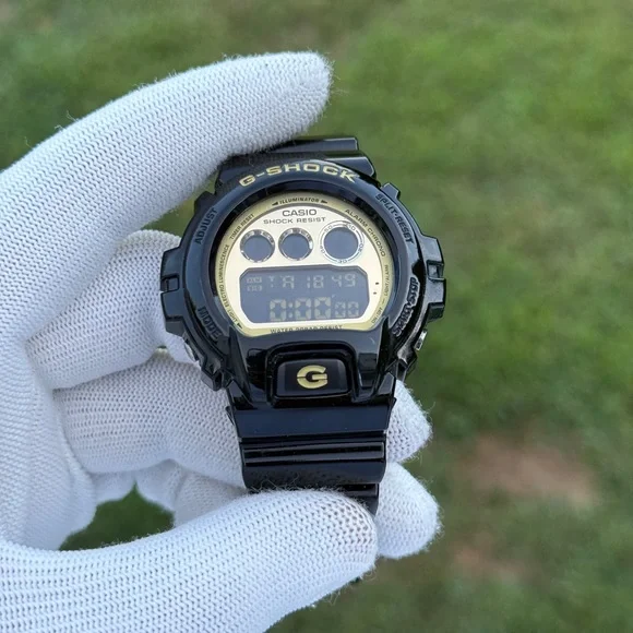 G-SHOCK Black and Gold Digital Watch men’s